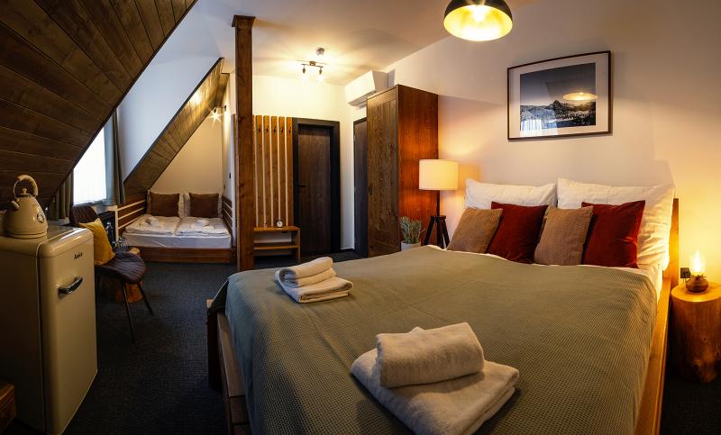 Útulné izby s veľkými a pohodlnými posteľami v Penzióne U Sysľa